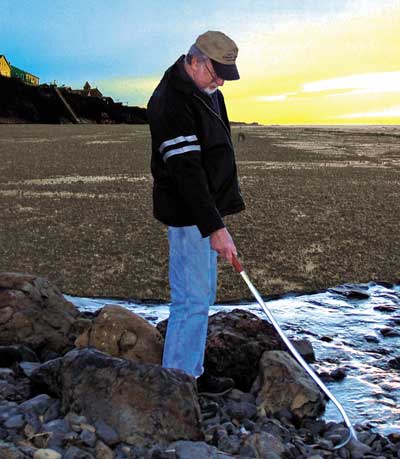 Illustration shows the NEW Gem Treasure Scoop - Shell & Gem Scoop used for collecting Agates of the Oregon Coast.  Great for recreational rockhounding as quoted from an avid rockhound - I'm glag to see the gem scoop available again, lately I have had re-occuring knee problems since my knee surgery (over 20 years ago), and the gem & treasure scoop allows me to continue my beachcombing and rockhounding. I use the treasure scoop like a trecking pole, as it is strong but ultralite and gives me a feeling of security and balance for breaking and confidence to help protect my joints and muscles from hiking impact lessening soreness on my knee.  In Stock and ships immediately.  To ensure availibility of this item, order as early as possible.